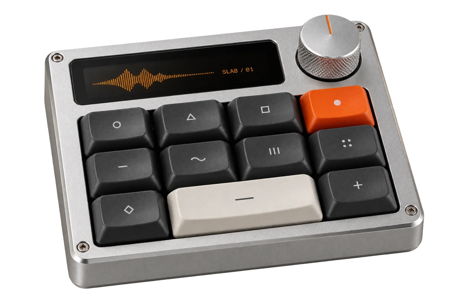 The eleven tactile keys, orange record key and wide ivory action key.